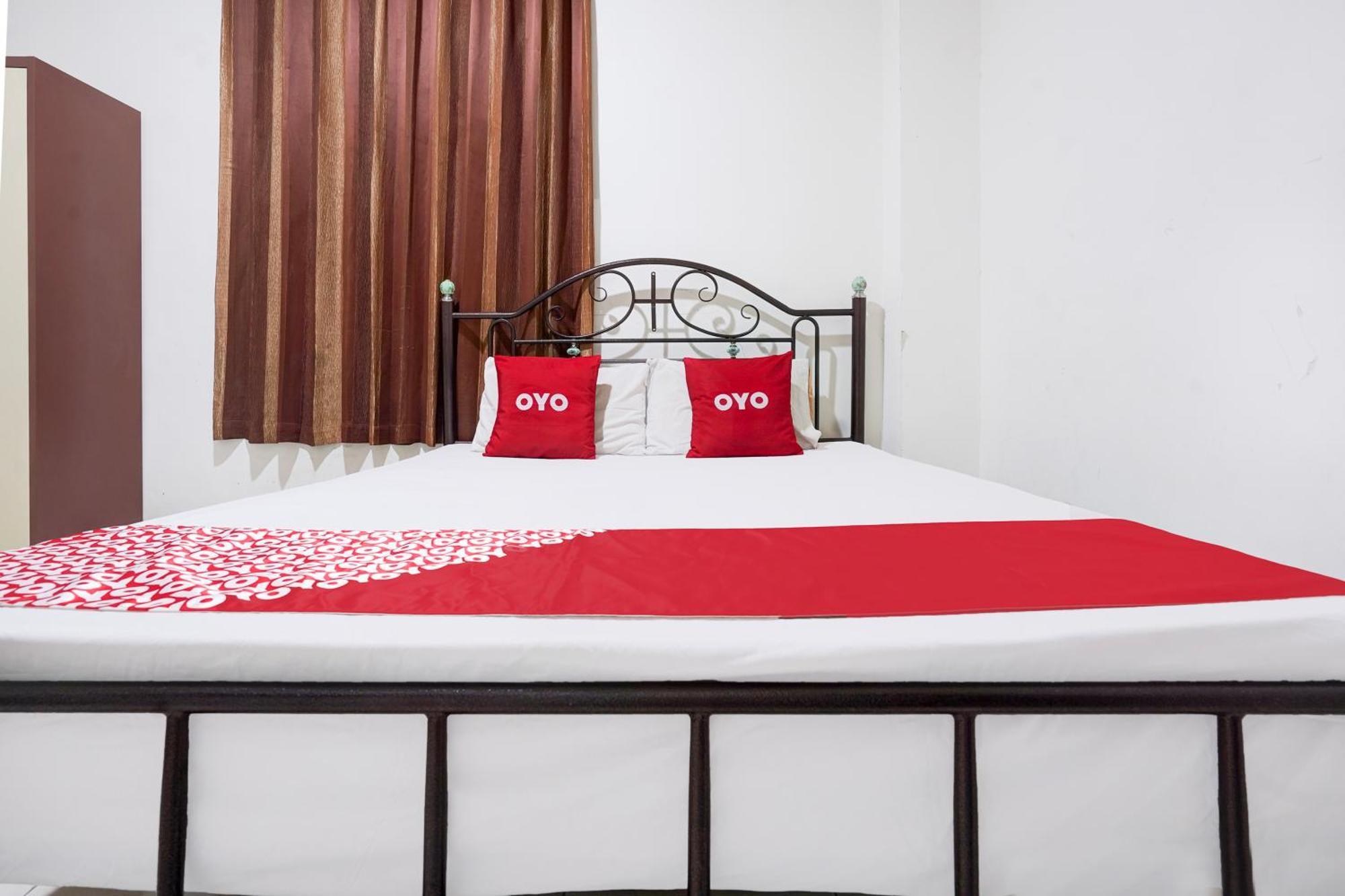 RedDoorz Syariah near AP Pettarani 3 Hotel Makassar Bagian luar foto