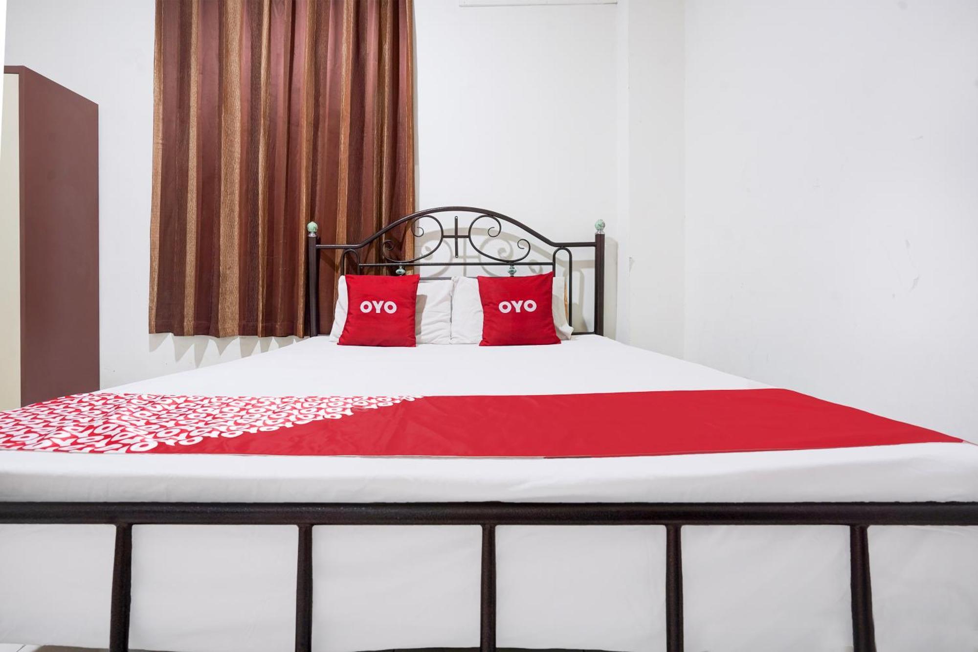 RedDoorz Syariah near AP Pettarani 3 Hotel Makassar Bagian luar foto